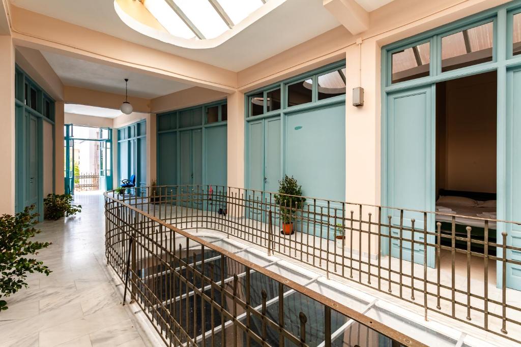 a balcony in a building with a skylight at Στούντιο Στη Στοά Βαρβουτσή #3 in Kalamata