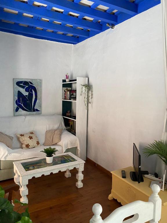 TV a/nebo společenská místnost v ubytování Casa Amparo casco histórico