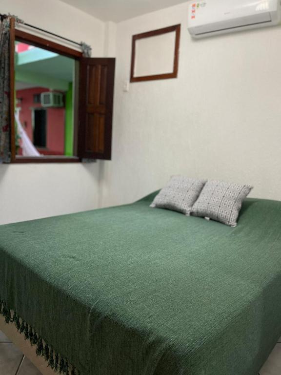 Postel nebo postele na pokoji v ubytování Pousada do Cacau