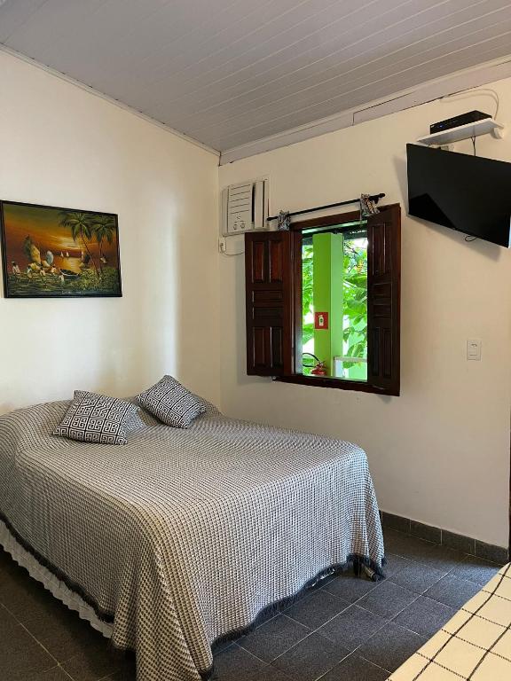 Postel nebo postele na pokoji v ubytování Pousada do Cacau