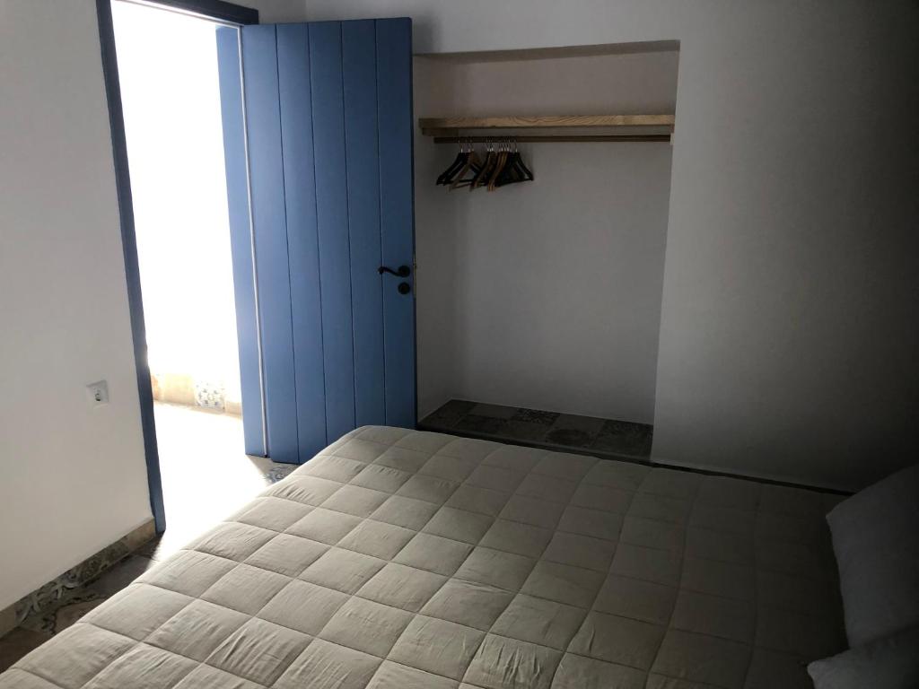 Postel nebo postele na pokoji v ubytování La Polena