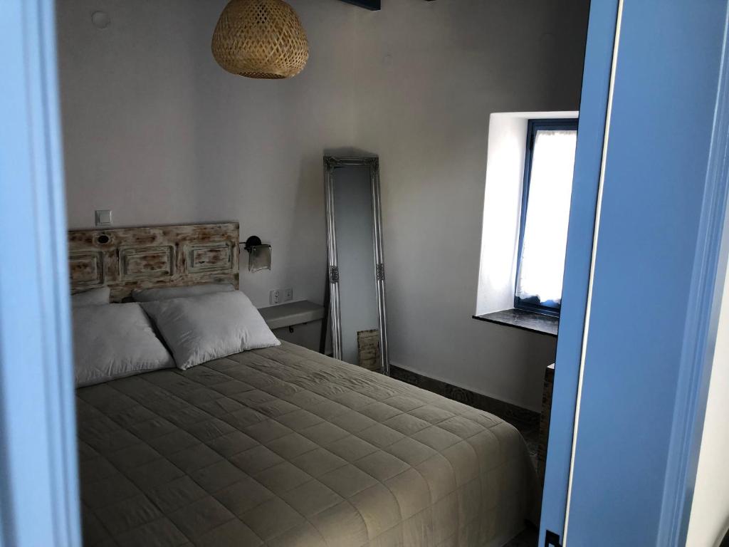 Postel nebo postele na pokoji v ubytování La Polena