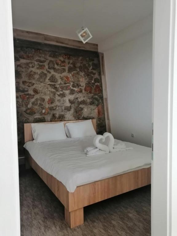 Postel nebo postele na pokoji v ubytování CHRIS sopo