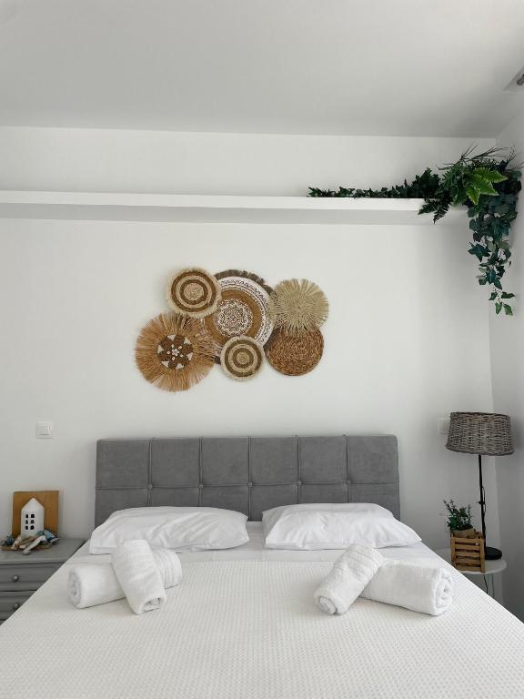 Postel nebo postele na pokoji v ubytování Kyma Luxury Suite