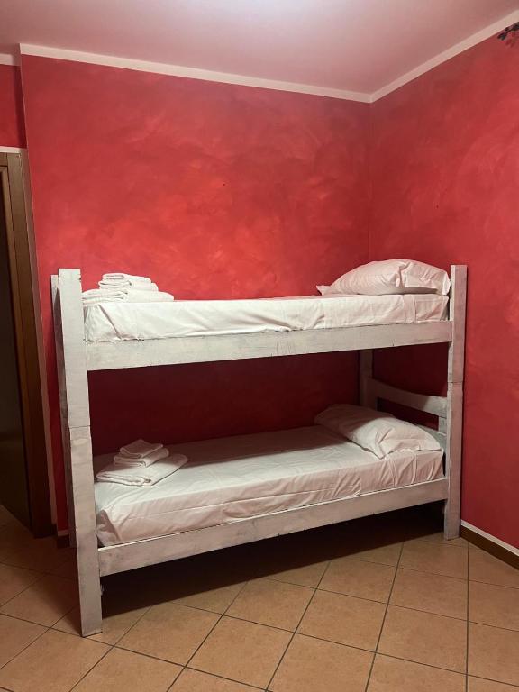 Postel nebo postele na pokoji v ubytování Albergo quatro pini