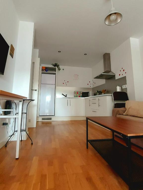 Kuchyň nebo kuchyňský kout v ubytování Ático coqueto con terraza