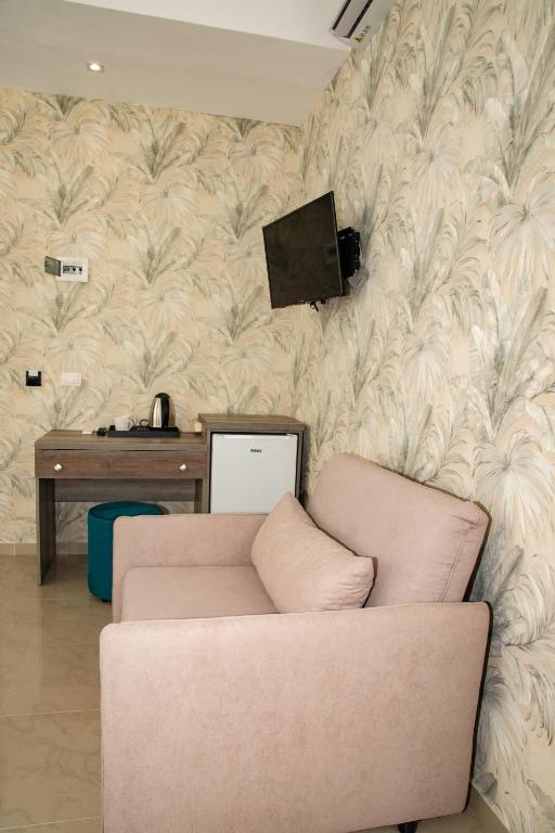 TV a/nebo společenská místnost v ubytování Alv Rent Rooms
