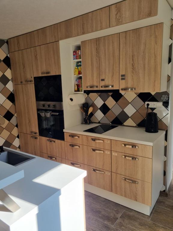 Kuchyň nebo kuchyňský kout v ubytování Apartmány 235 - 1