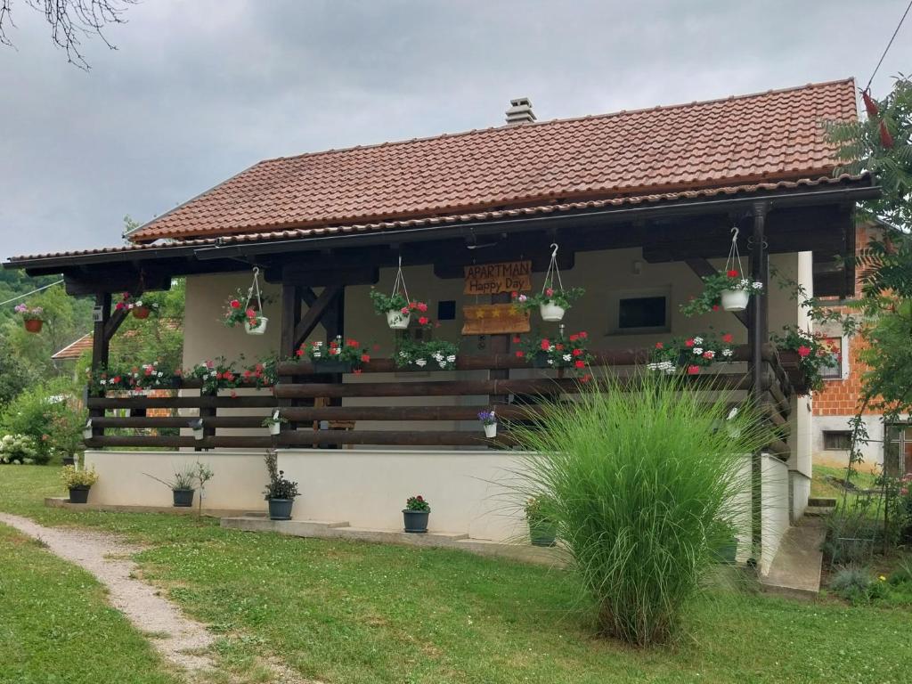 Vonkajšia záhrada v ubytovaní Guest House Happy day