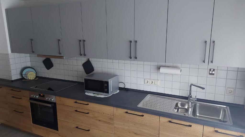 Kuchyň nebo kuchyňský kout v ubytování Haus Woschi Kehl-Auenheim