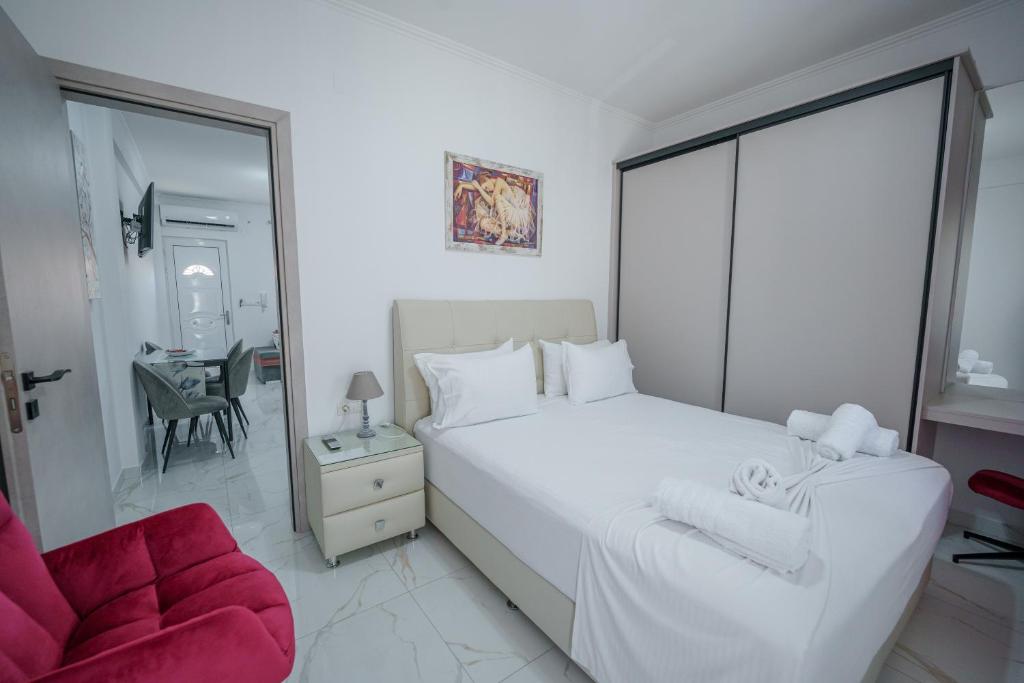 A bed or beds in a room at Maria's Home
