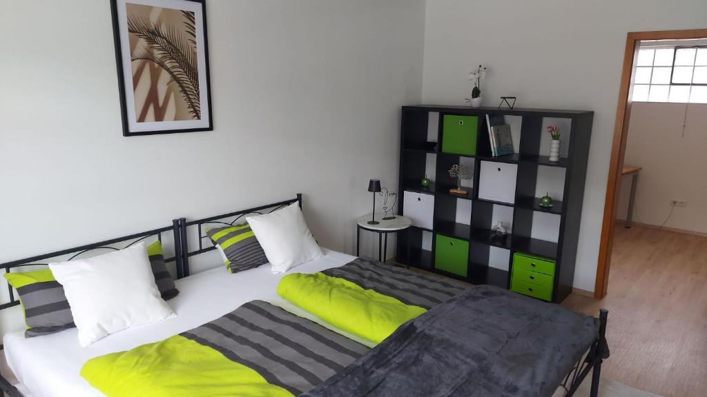 Postel nebo postele na pokoji v ubytování Haus Woschi Kehl-Auenheim