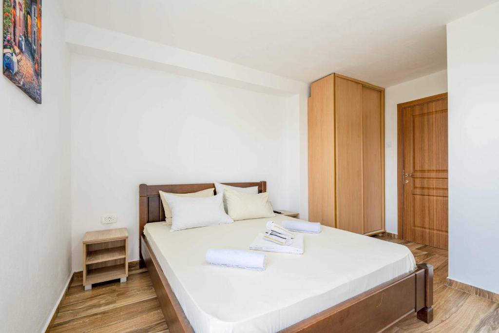 Postel nebo postele na pokoji v ubytování Sumice Inn