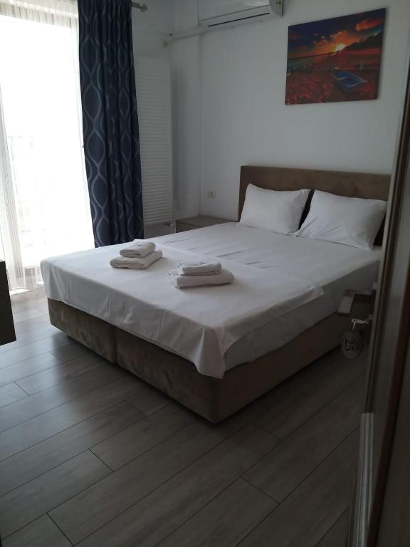 Postel nebo postele na pokoji v ubytování Vila Ame Eforie Nord