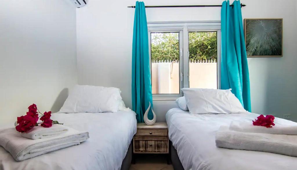 Postel nebo postele na pokoji v ubytování Beach Life Apartments