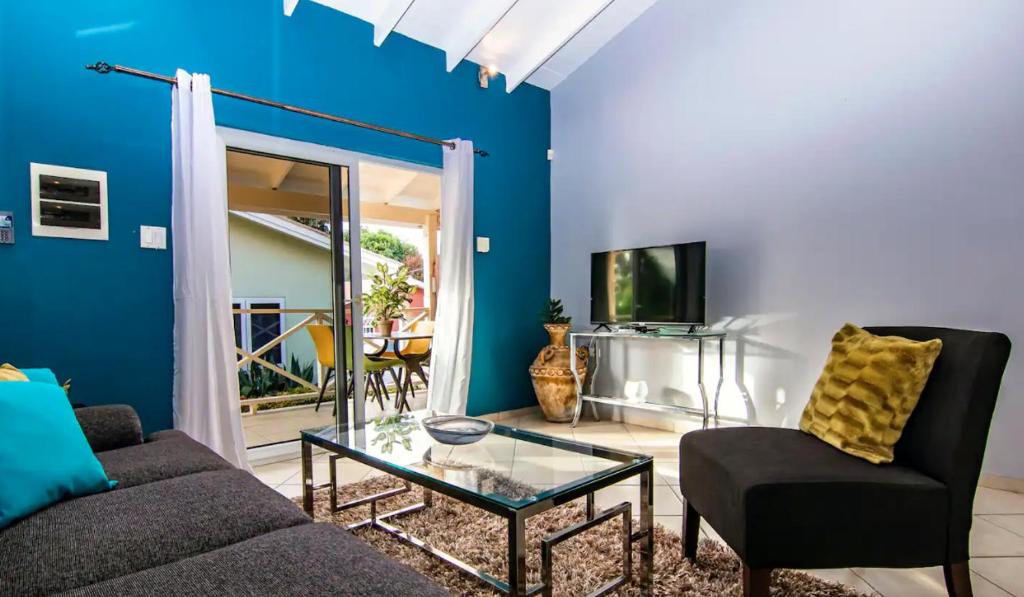 TV a/nebo společenská místnost v ubytování Beach Life Apartments