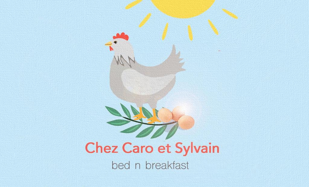 a chicken is standing on a nest with eggs at Chez Caro et Sylvain in Rimouski