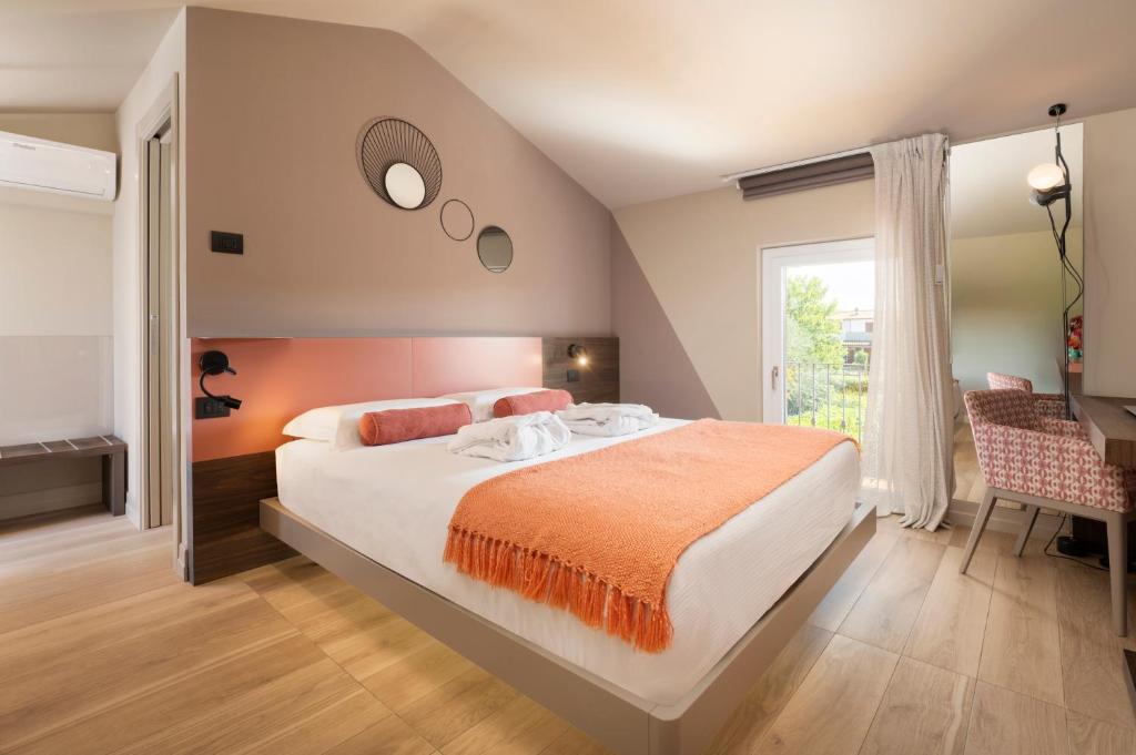 Postel nebo postele na pokoji v ubytování B&B Relais One