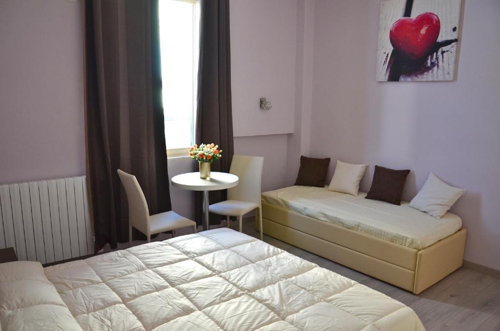 Posteľ alebo postele v izbe v ubytovaní Florence Stadium B&B