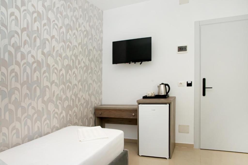 Postel nebo postele na pokoji v ubytování Alv Rent Rooms