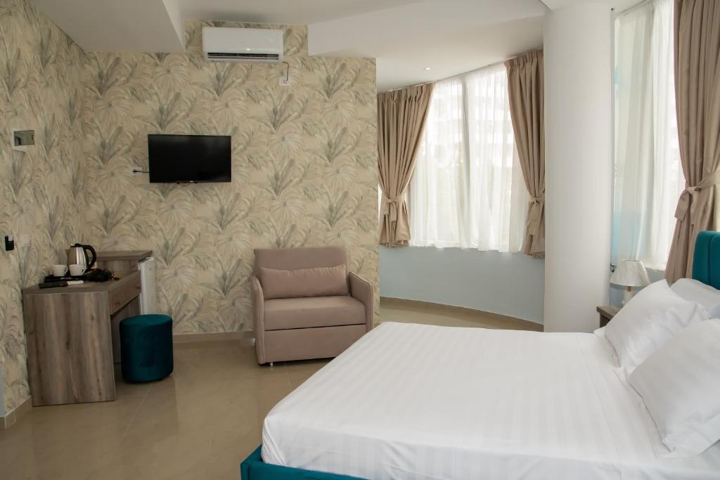 Postel nebo postele na pokoji v ubytování Alv Rent Rooms