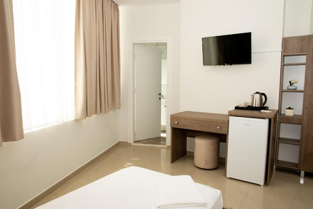 Postel nebo postele na pokoji v ubytování Alv Rent Rooms