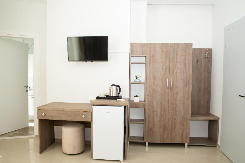 Kuchyň nebo kuchyňský kout v ubytování Alv Rent Rooms
