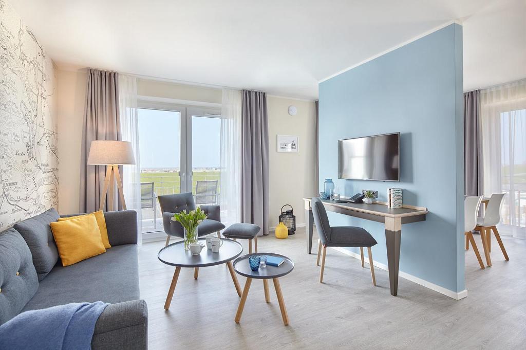 Et opholdsområde på 3-Raum-Ferienwohnung ohne Meerblick