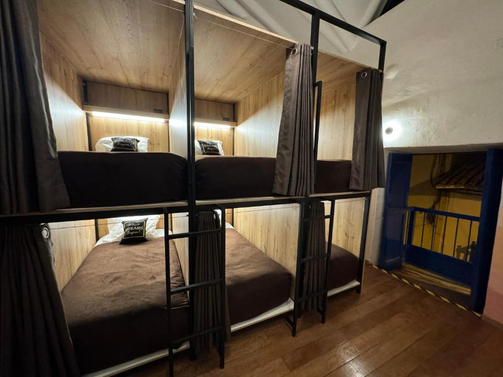 Krevet ili kreveti u jedinici u okviru objekta Way Kap Hostel Cusco