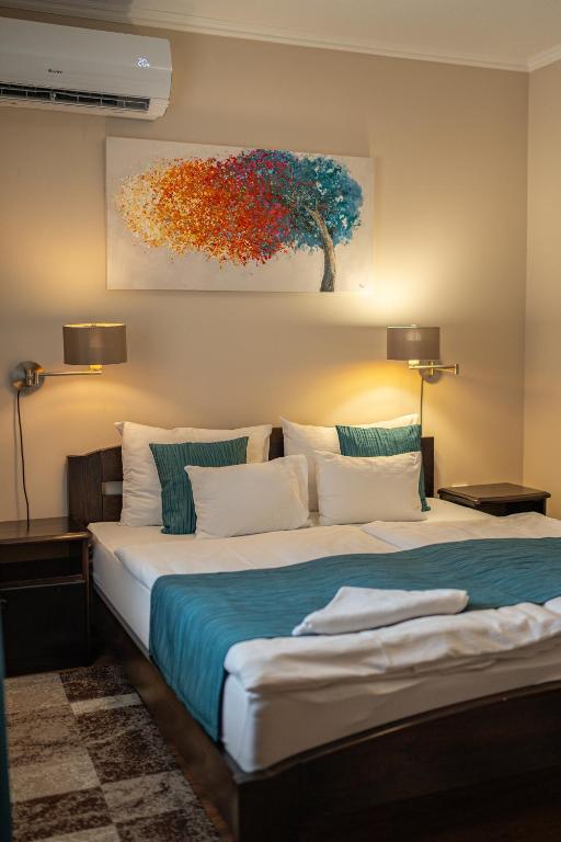 Postel nebo postele na pokoji v ubytování MeDoRa Park - Hotel MeDoRa***