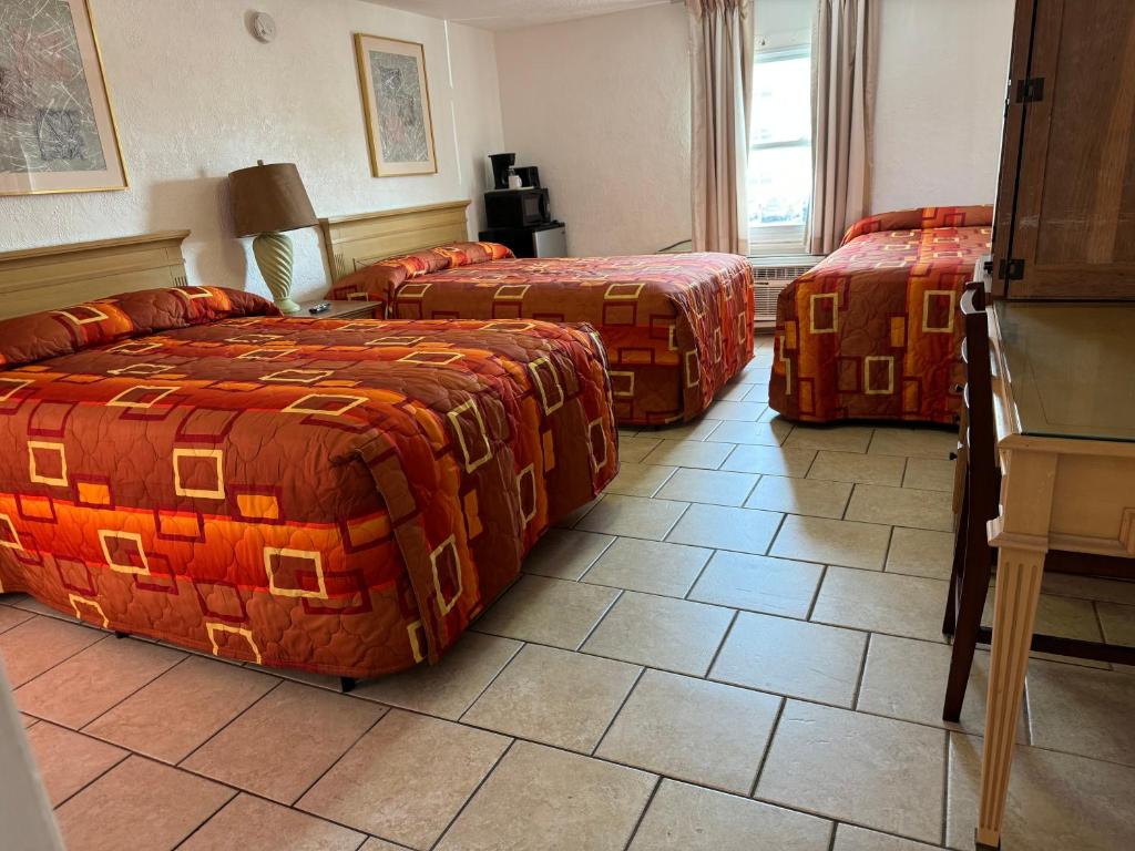 Postel nebo postele na pokoji v ubytování El Ray Motel