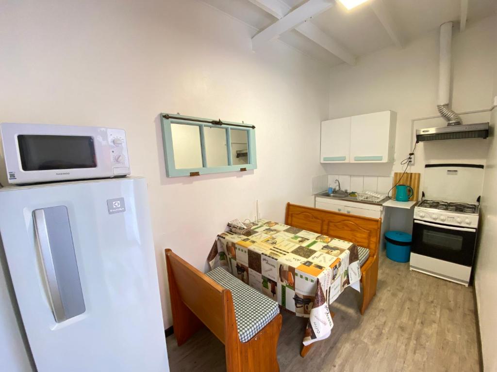 Kuchyň nebo kuchyňský kout v ubytování Habitaciones Mar Azul