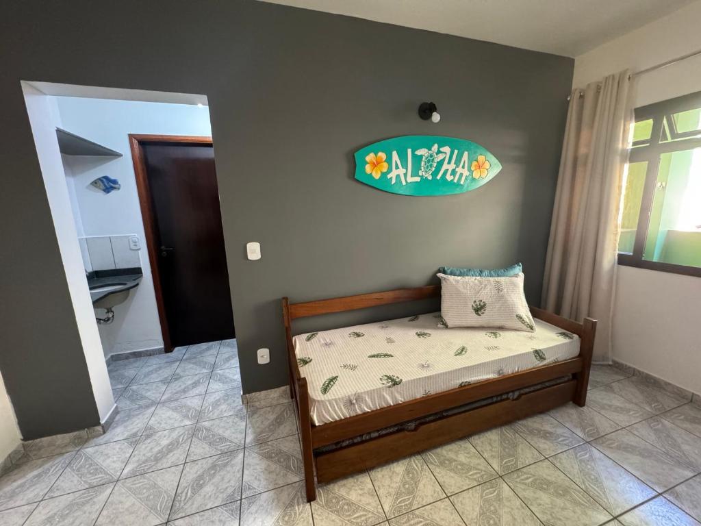 Postel nebo postele na pokoji v ubytování Apartamentos e Flats da Taty Praia das Toninhas - Ubatuba