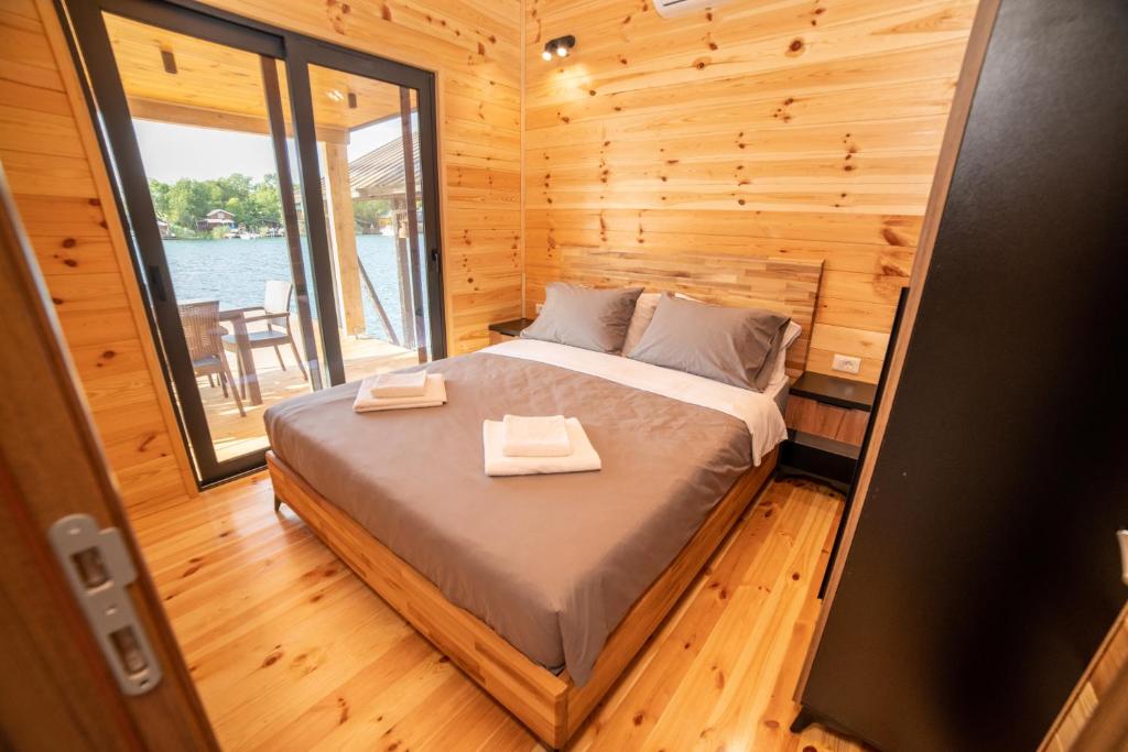 Postel nebo postele na pokoji v ubytování River house - Esperanza