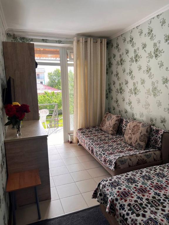 Posezení v ubytování Podsolnukhi Guest House