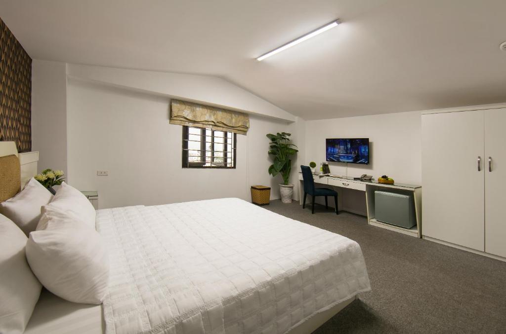 TV a/nebo společenská místnost v ubytování Hanoi Kingly Hotel