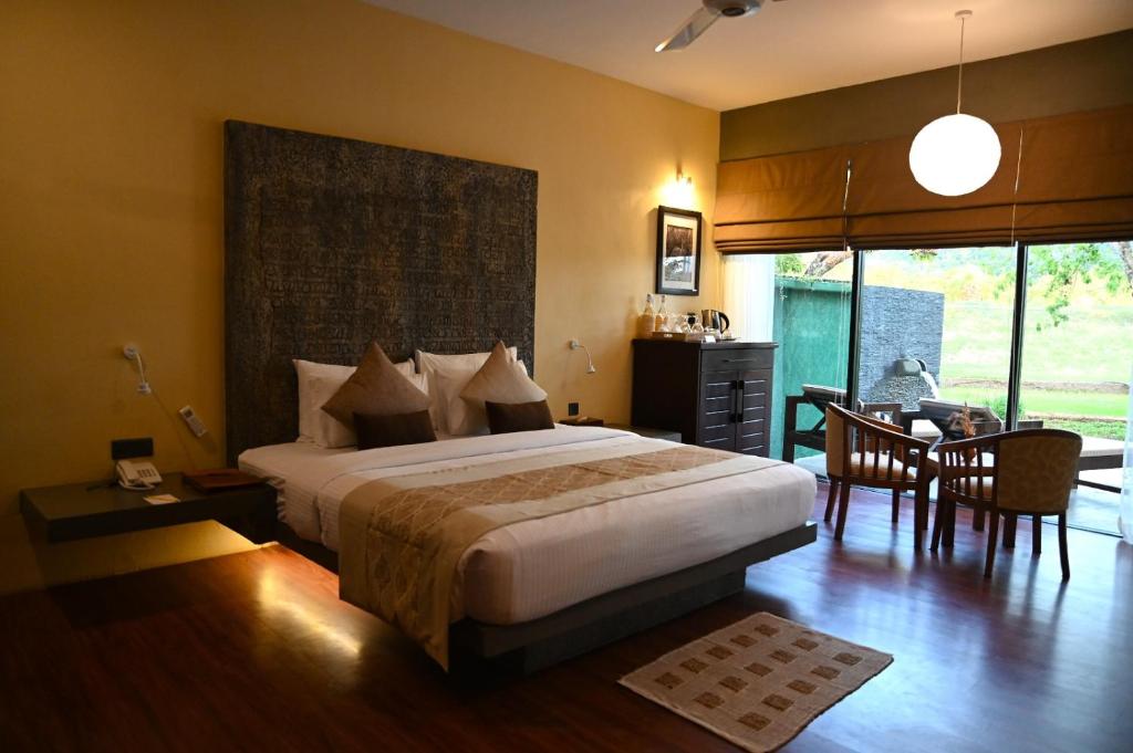 Postel nebo postele na pokoji v ubytování Sigiriya King's Resort