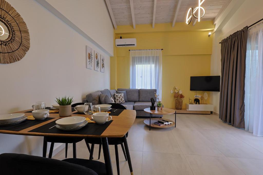 TV a/nebo společenská místnost v ubytování Mythical Olympus Mare Seaside Pool Villas