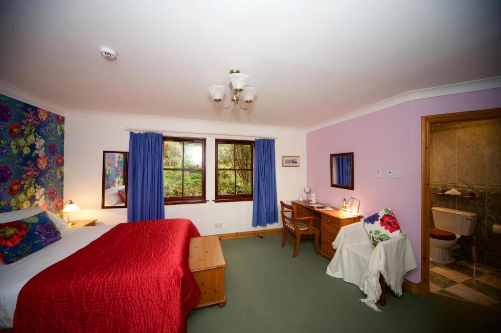 Postel nebo postele na pokoji v ubytování Craigard House Hotel