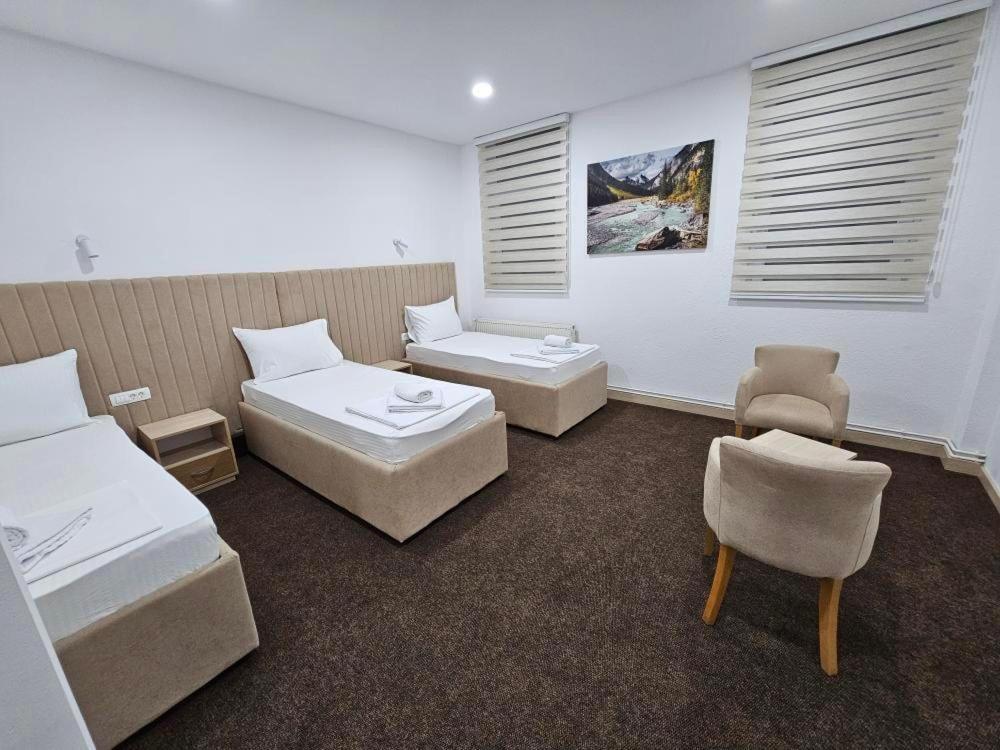 Postel nebo postele na pokoji v ubytování Naš Dom - MOTEL