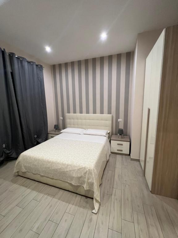 Postel nebo postele na pokoji v ubytování La Suite