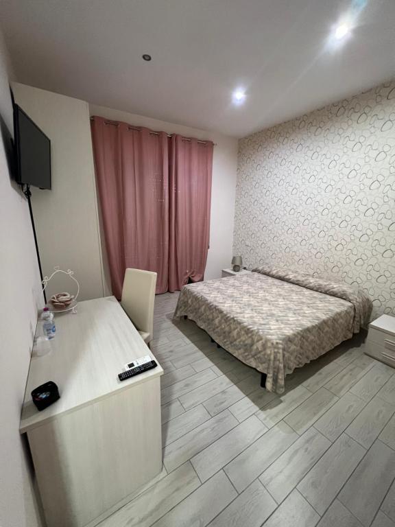 Postel nebo postele na pokoji v ubytování La Suite