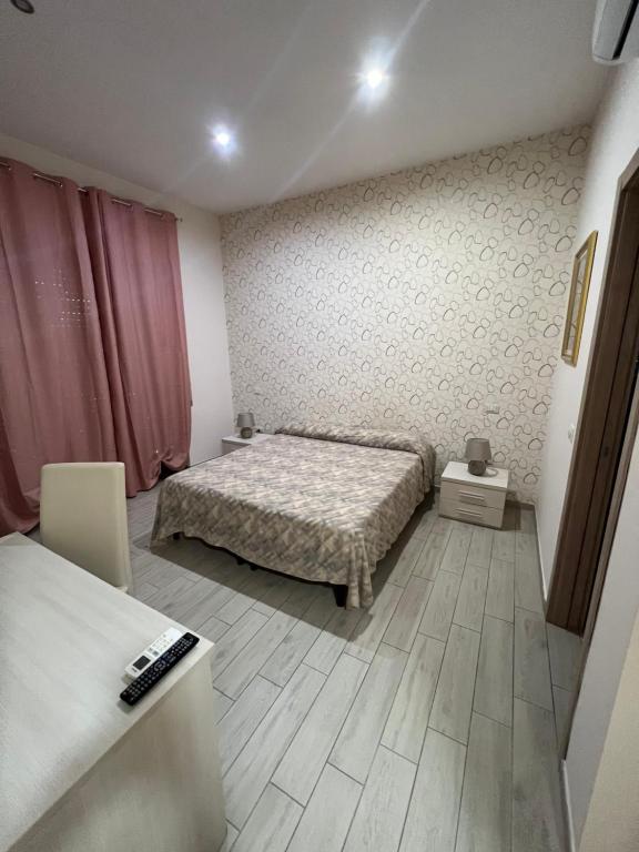 Postel nebo postele na pokoji v ubytování La Suite