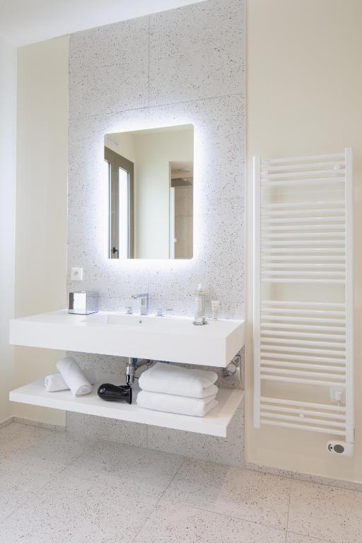 Koupelna v ubytování Hôtel La Suite
