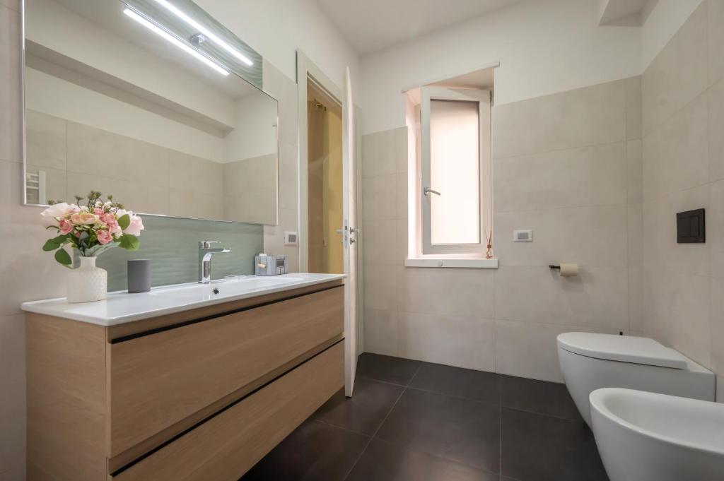 Koupelna v ubytování LA META ROOMS