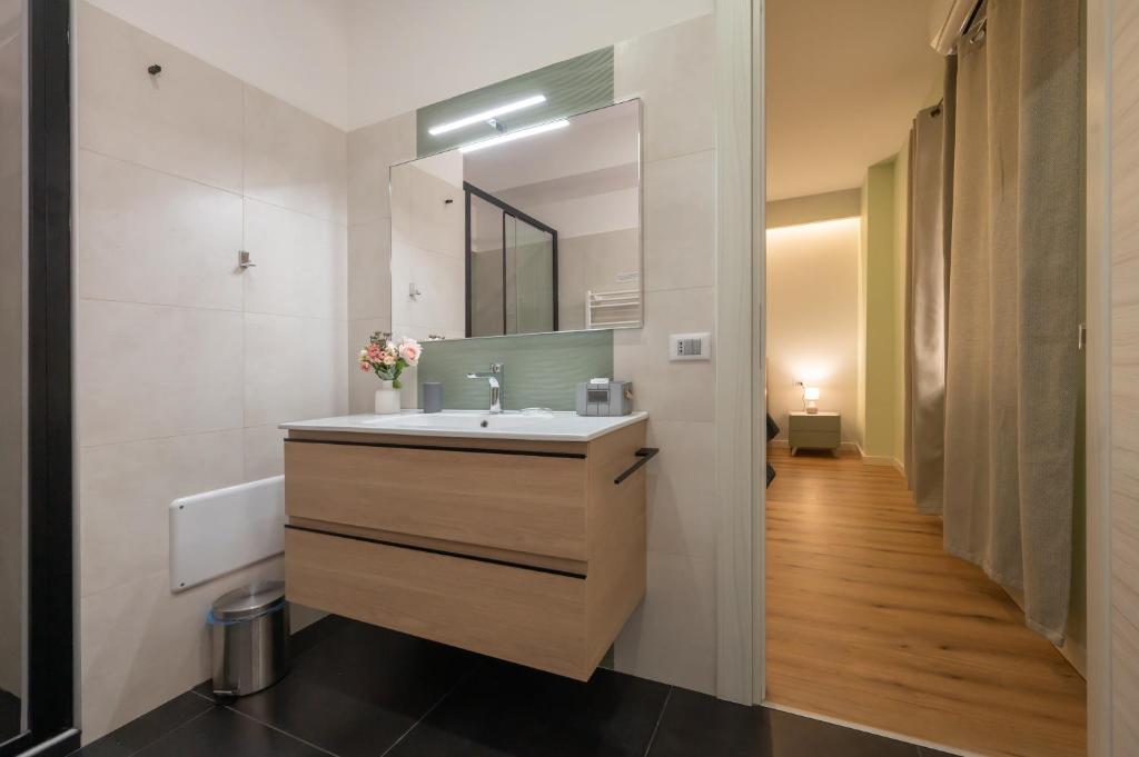 Koupelna v ubytování LA META ROOMS