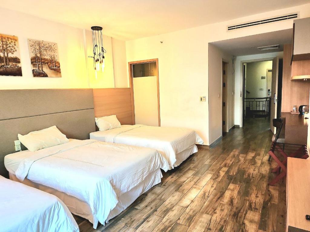 Postel nebo postele na pokoji v ubytování CHILCHILL Hotel Riverside