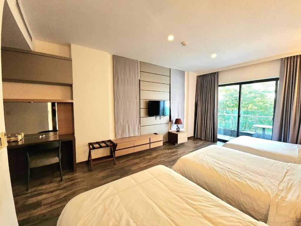 Postel nebo postele na pokoji v ubytování CHILCHILL Hotel Riverside