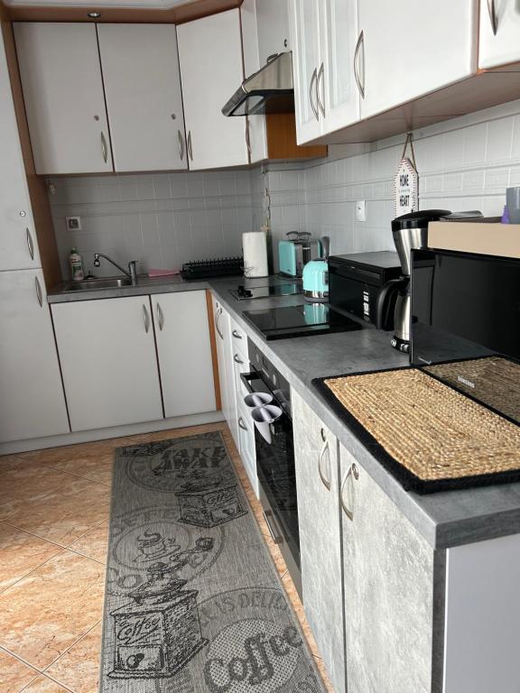 Kuchyňa alebo kuchynka v ubytovaní Apartament na nowej starówce