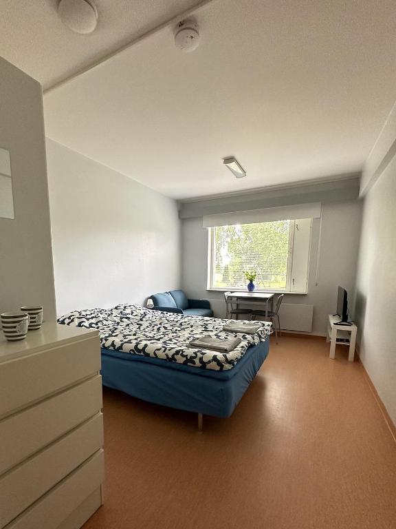 Lepopaikka Lokinpesä, Majoitus ja Camping - Chambre Double Avec Salle De Bains Commune
